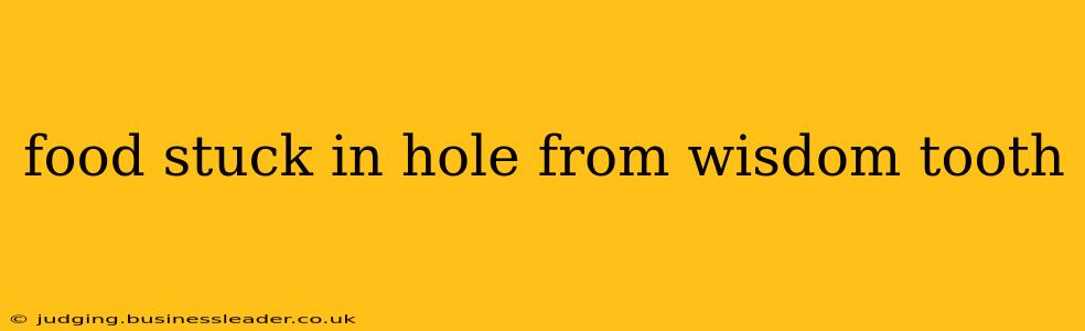 food stuck in hole from wisdom tooth
