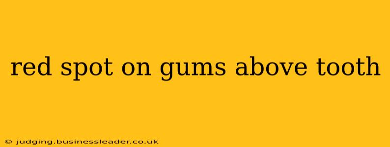 red spot on gums above tooth