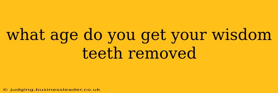what age do you get your wisdom teeth removed