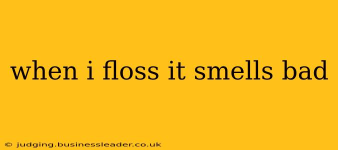 when i floss it smells bad