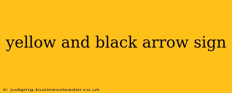 yellow and black arrow sign